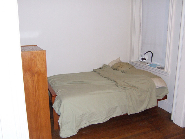 Minimalist White Storage Bed